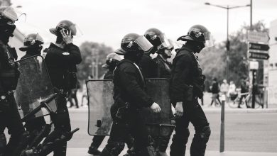 group of police grayscale photo